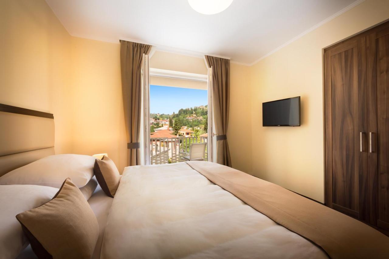 Remisens Casa Rosa - Hotel Metropol Annexe بورتوروز الغرفة الصورة